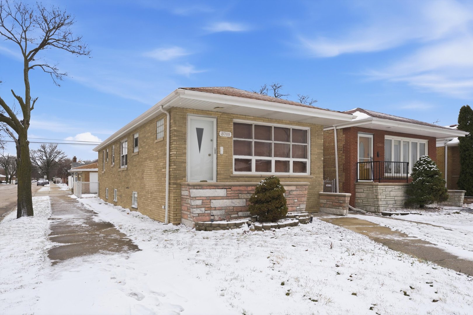 3701 West 80th Street Chicago, IL 60652 - Photo 4 of 34 a front view of a house with a yard