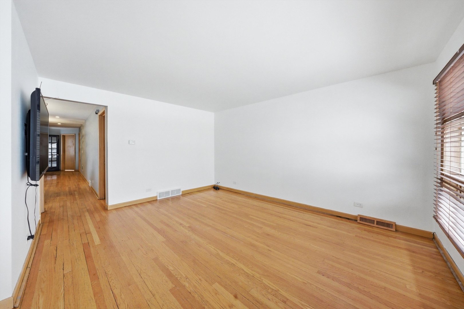 3701 West 80th Street Chicago, IL 60652 - Photo 7 of 34 a view of empty room with wooden floor and fan