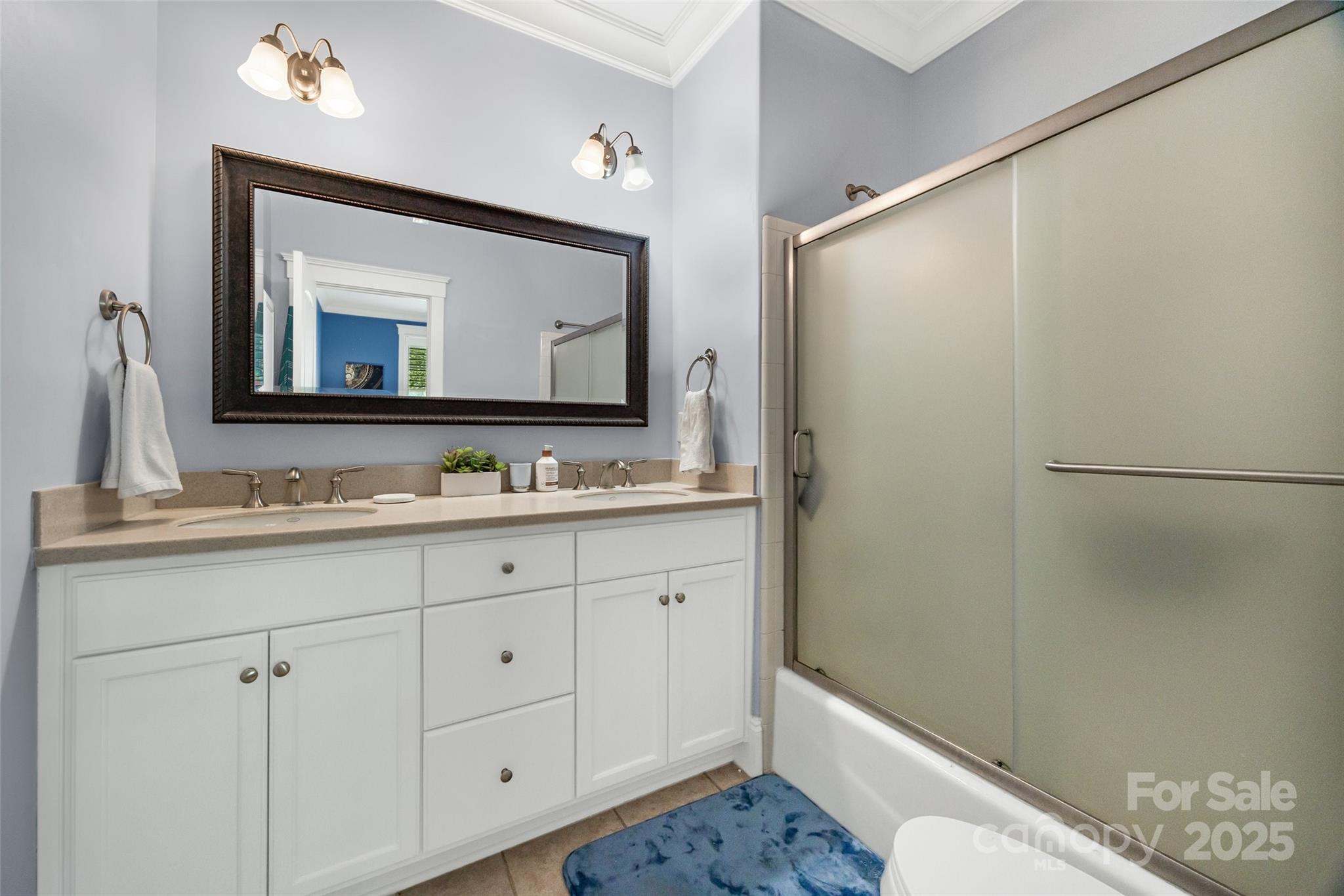 321 Landers Way Belmont, NC 28012 - Photo 14 of 26 a bathroom with a granite countertop sink mirror and a