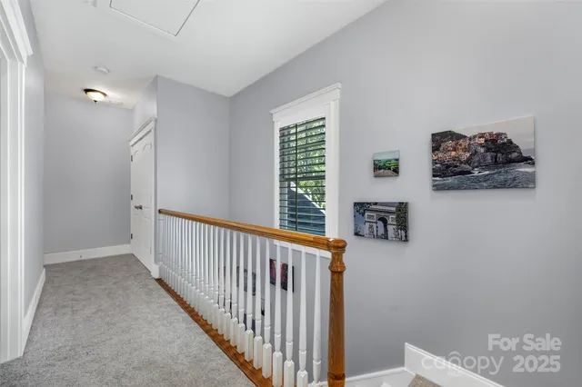 a living room with furniture rug and window