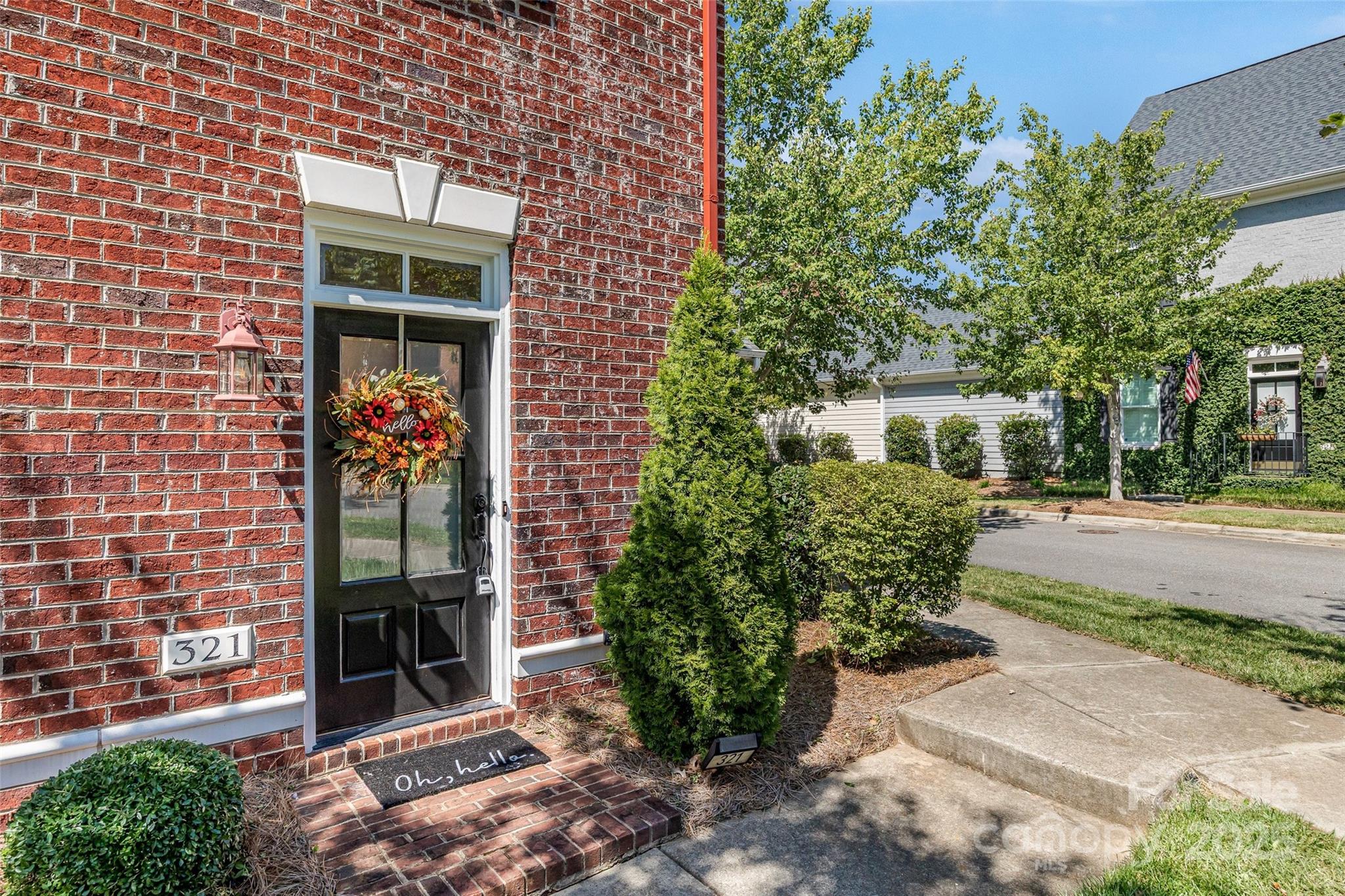 321 Landers Way Belmont, NC 28012 - Photo 2 of 26 a front view of a house with a yard