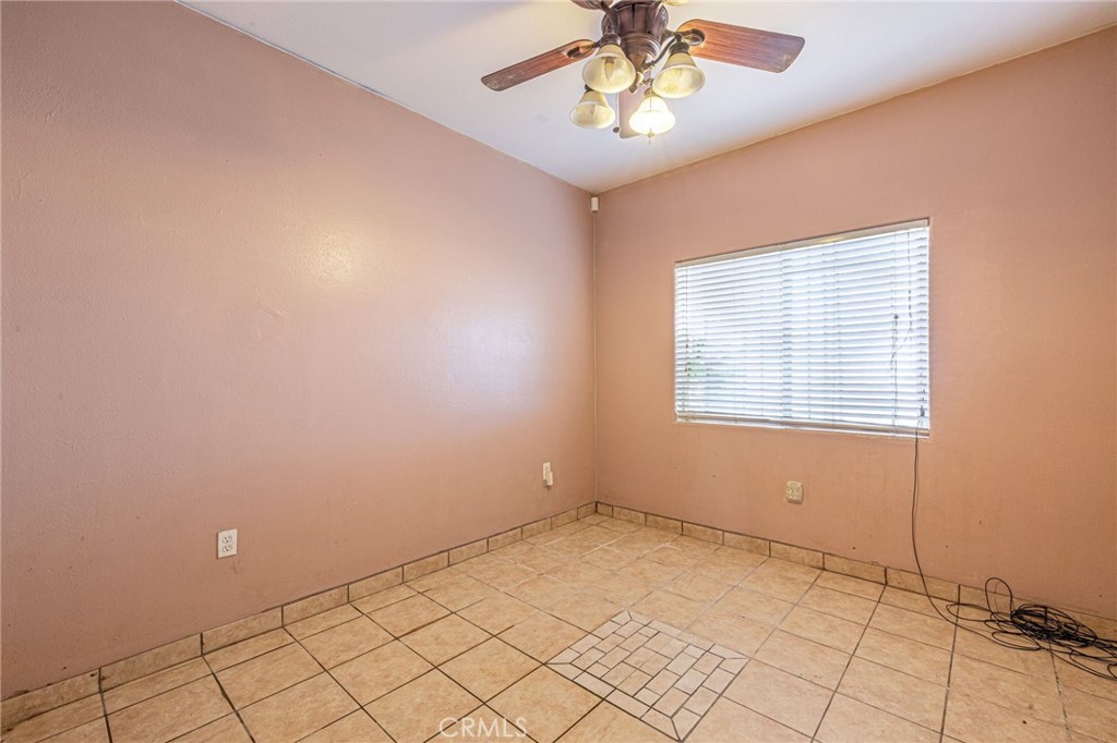 21419-21419 Neuralia Road California City, CA 93505 - Photo 21 of 35 a view of an empty room with a window