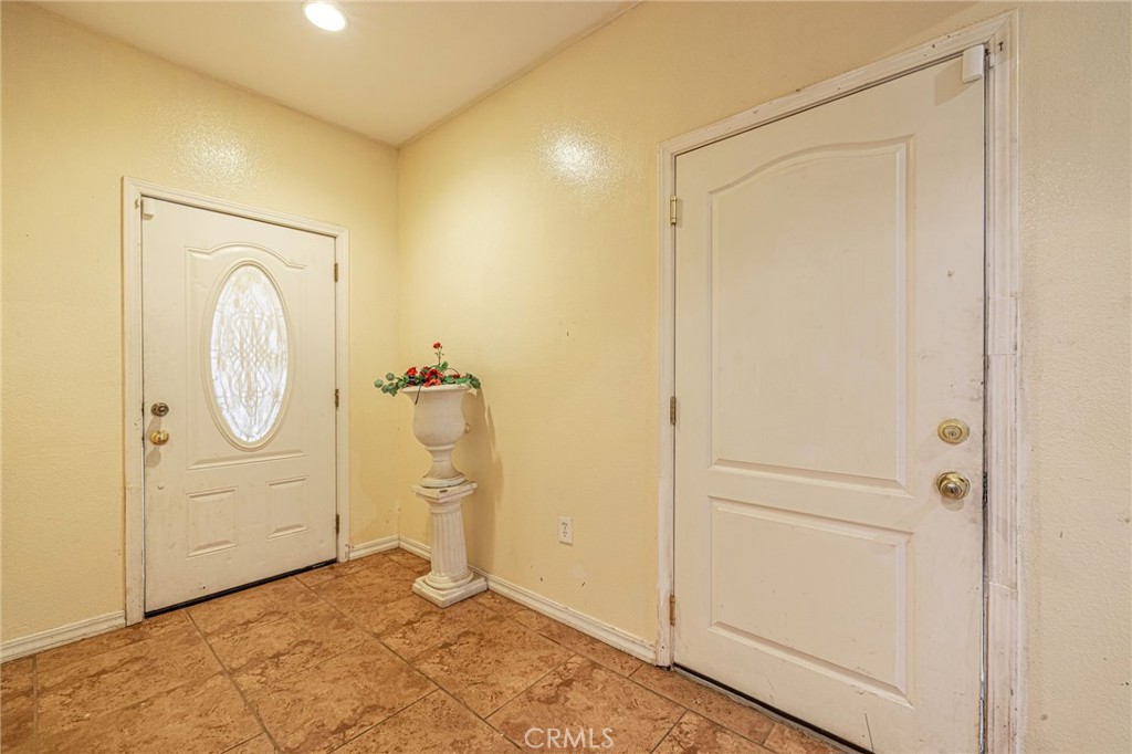 21419-21419 Neuralia Road California City, CA 93505 - Photo 8 of 35 a view of a utility room with cabinet