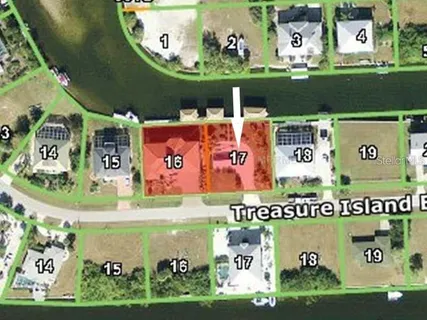 a front view of a house with a yard and a garage