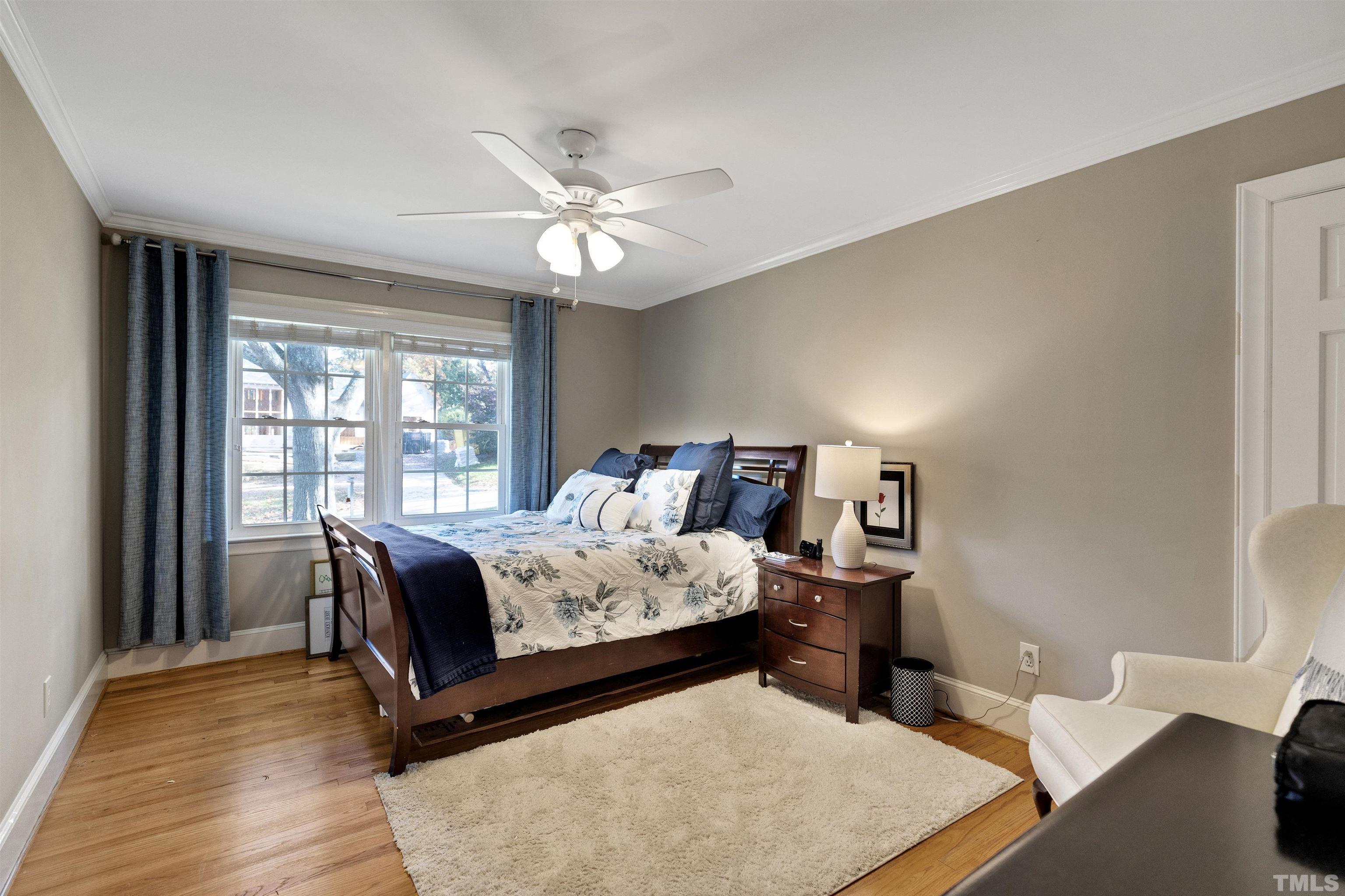 6813 Foxfire Place Raleigh, NC 27615 - Photo 20 of 38 a bed room with a bed and a window