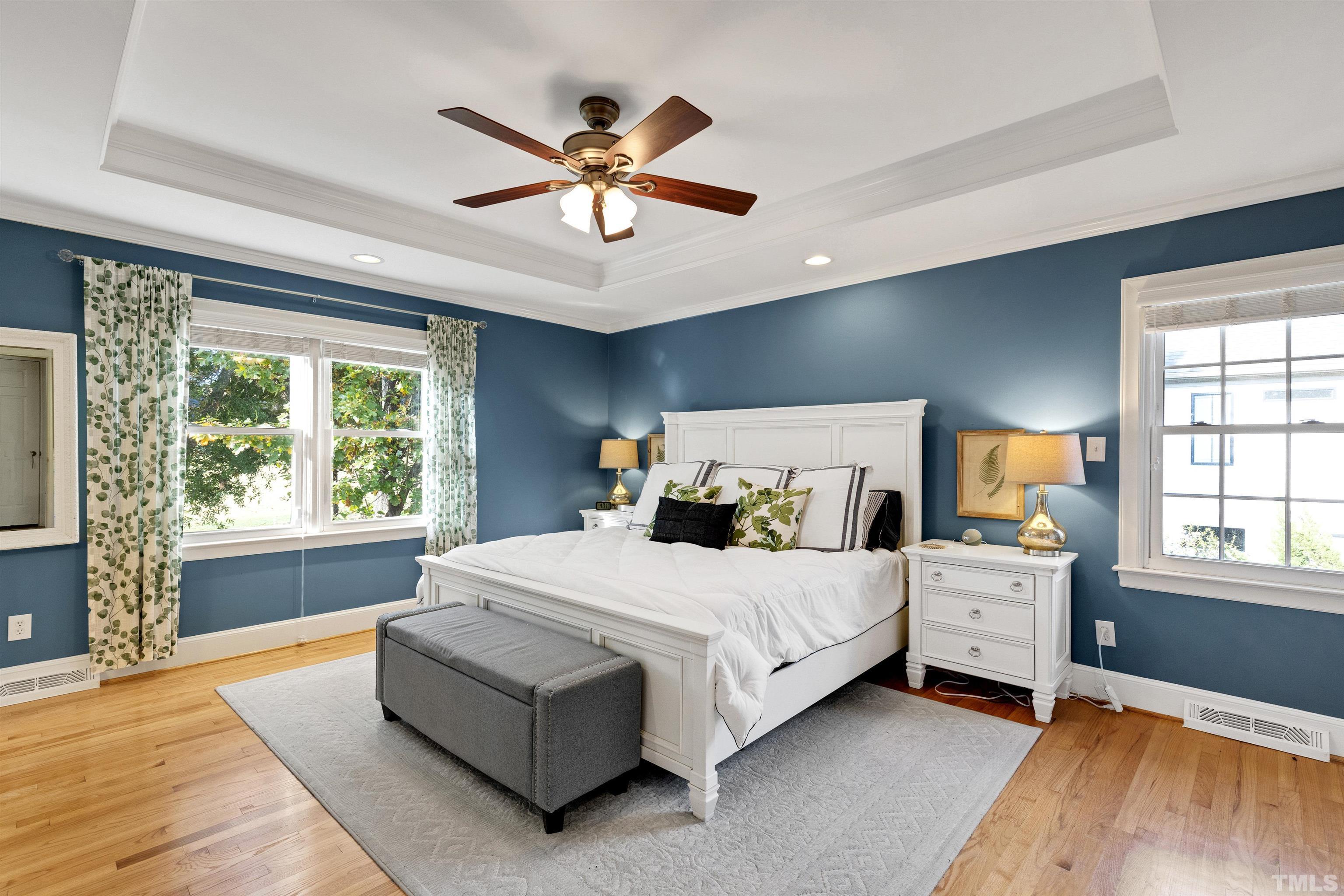 6813 Foxfire Place Raleigh, NC 27615 - Photo 23 of 38 a bedroom with a large bed and a window