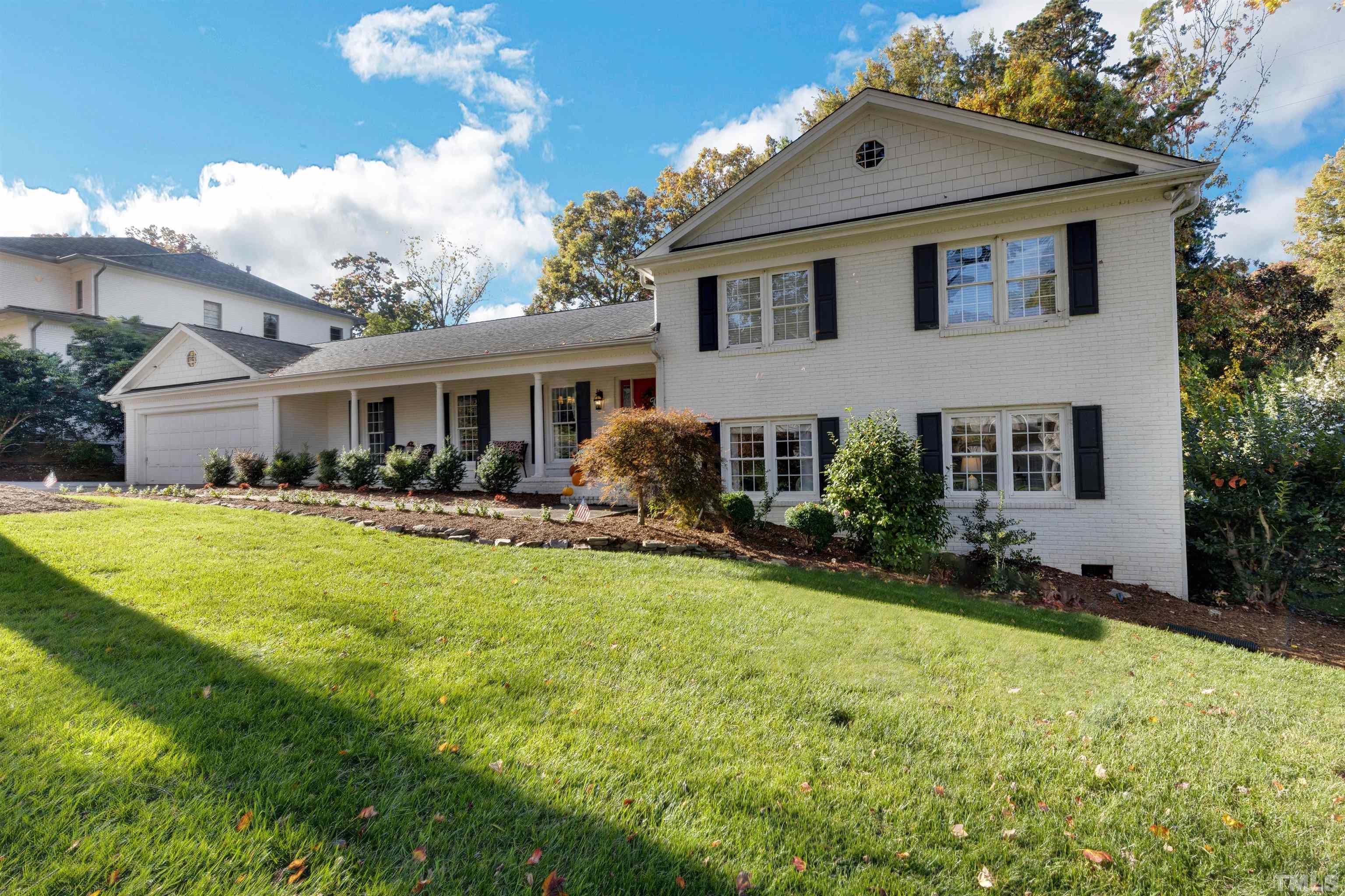 6813 Foxfire Place Raleigh, NC 27615 - Photo 3 of 38 a front view of house with yard and green space