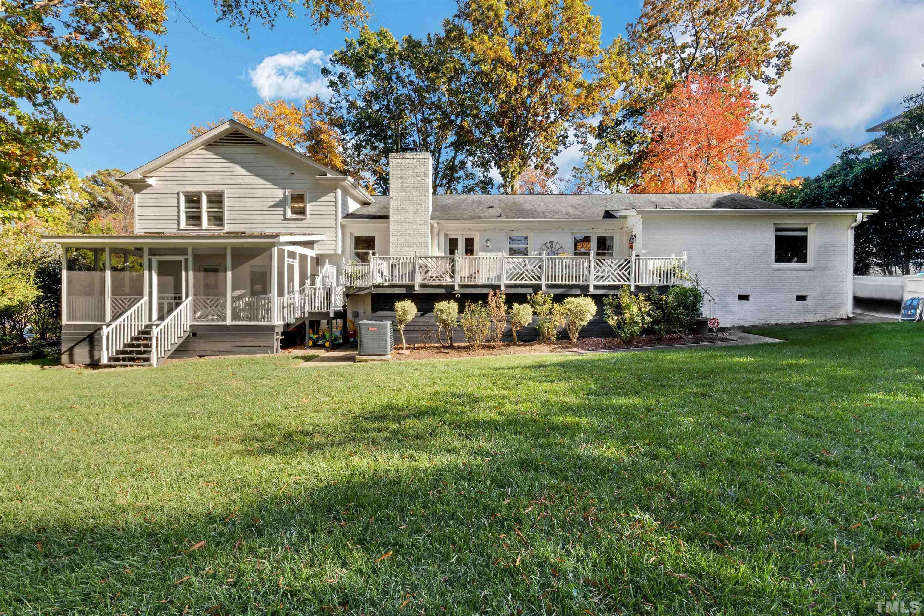 6813 Foxfire Place Raleigh, NC 27615 - Photo 32 of 38 a front view of a house with garden