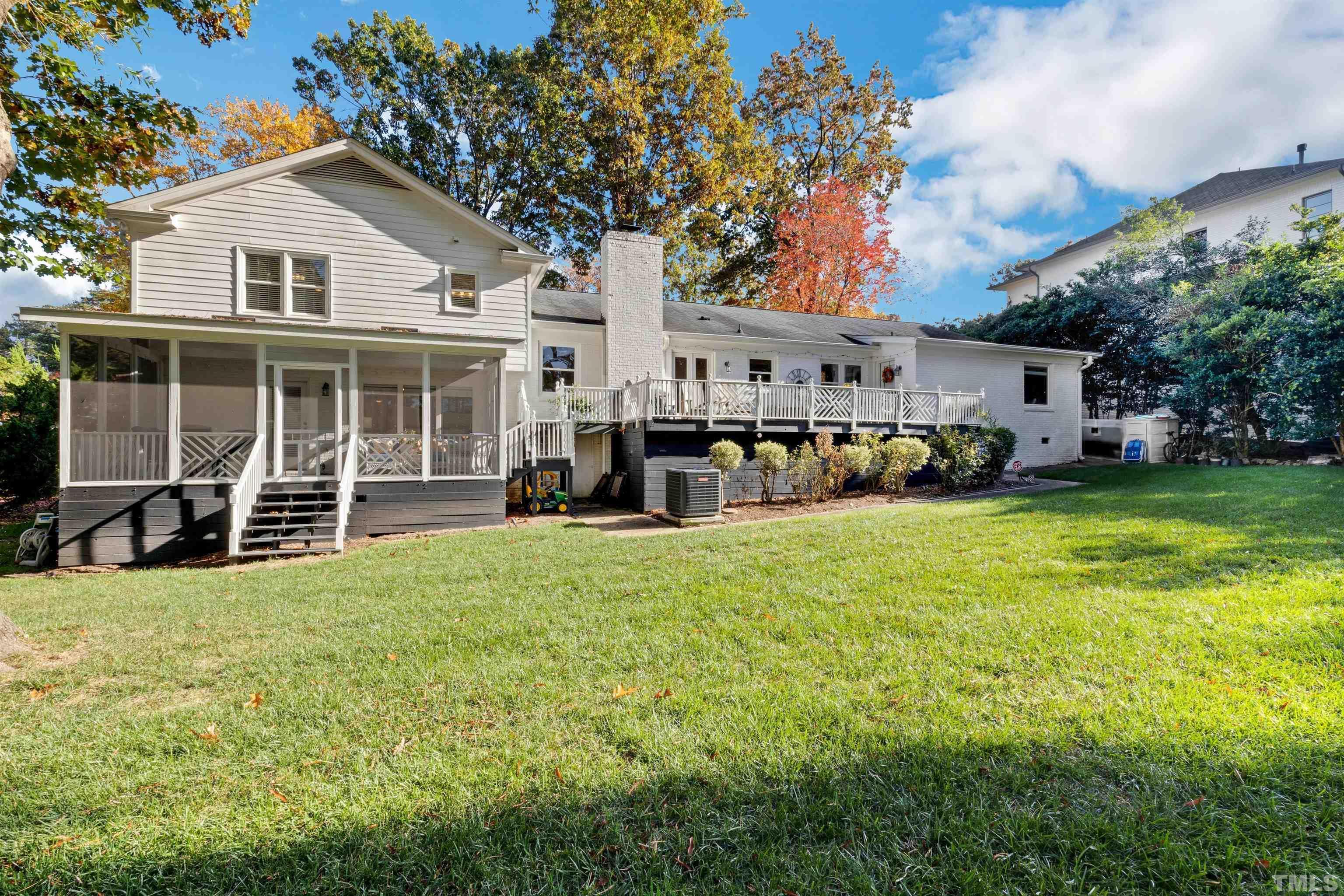 6813 Foxfire Place Raleigh, NC 27615 - Photo 33 of 38 a view of a house with a big yard and large trees