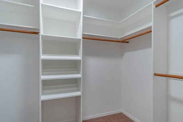 a view of a livingroom with a ceiling fan