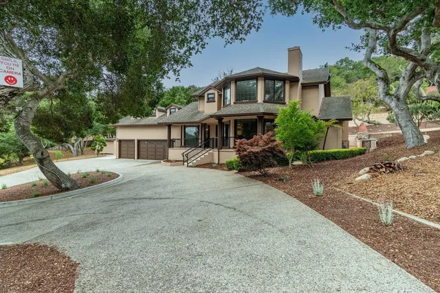 front view of a house with a small yard