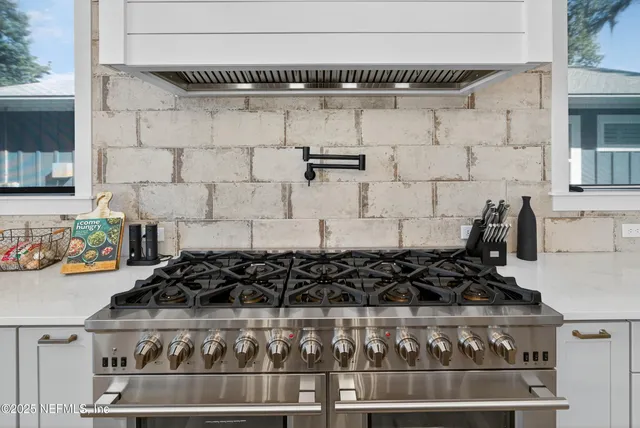 a bedroom with bed and a window