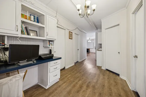 a view of a livingroom with furniture and wooden floor