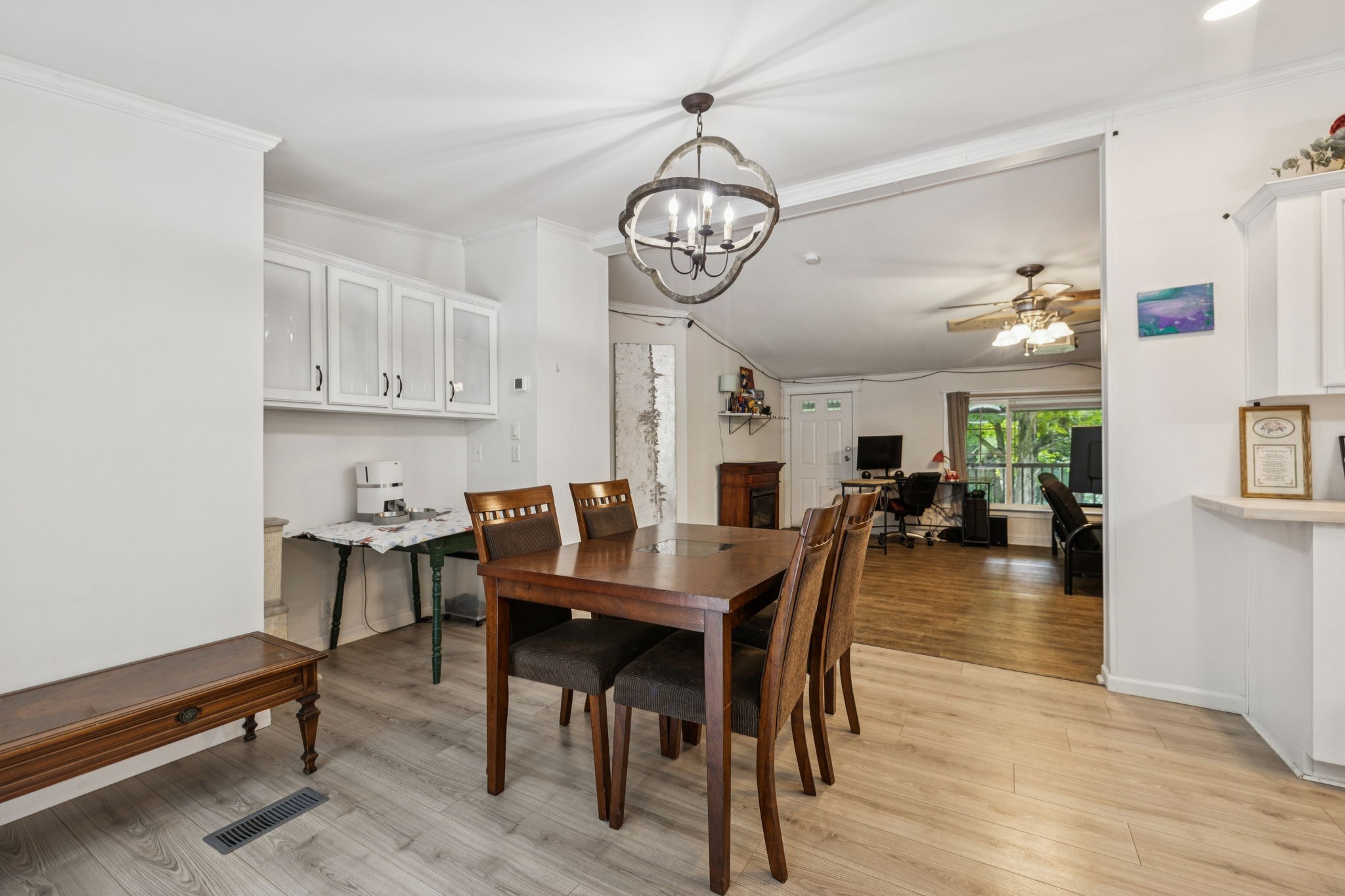 3063 Sweethome Road Chapmansboro, TN 37035 - Photo 16 of 46 a view of a dining room with furniture window and wooden floor