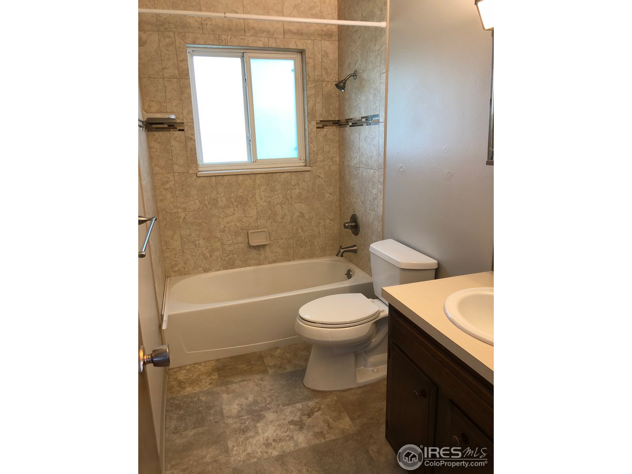 221 Briarwood Road Fort Collins, CO 80521 - Photo 16 of 35 Updated Tile Shower Surround & Fixtures