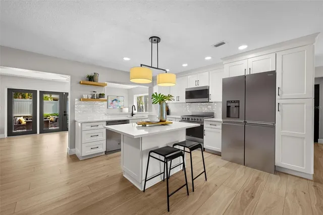 $567,900 | 6135 Tanglewood Drive Northeast, St. Petersburg, FL 33703