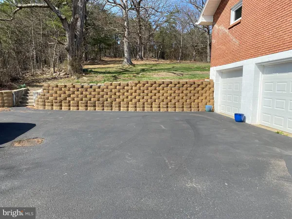 a view of a bench in a yard