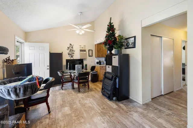 a kitchen with stainless steel appliances a sink and a refrigerator