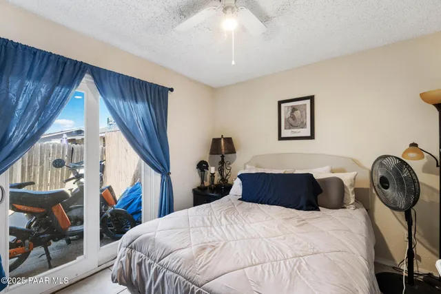 a bathroom with a sink vanity mirror and toilet