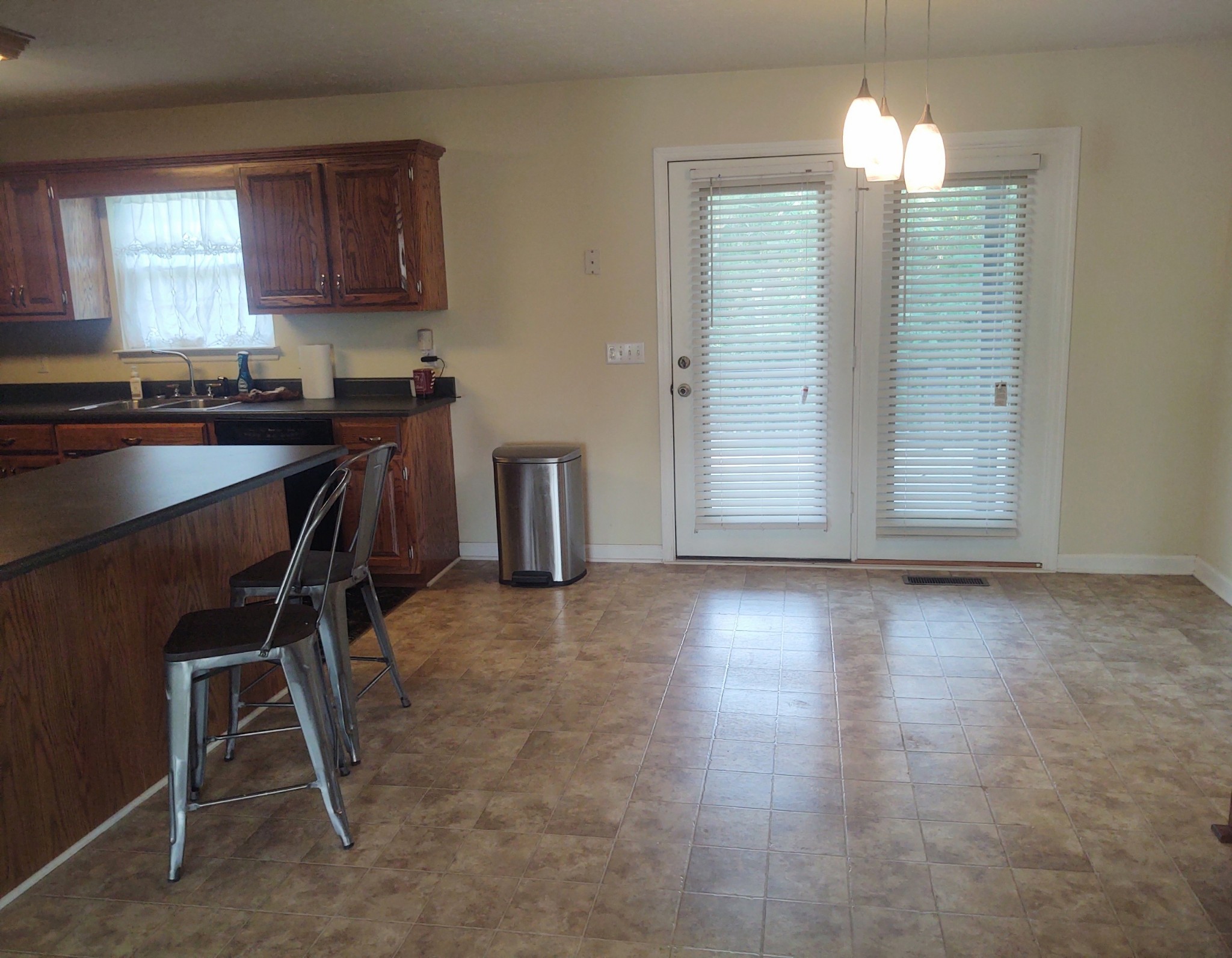 423 Ferguson Hill Road Lafayette, TN 37083 - Photo 17 of 63 a view of kitchen with granite countertop cabinets and chair