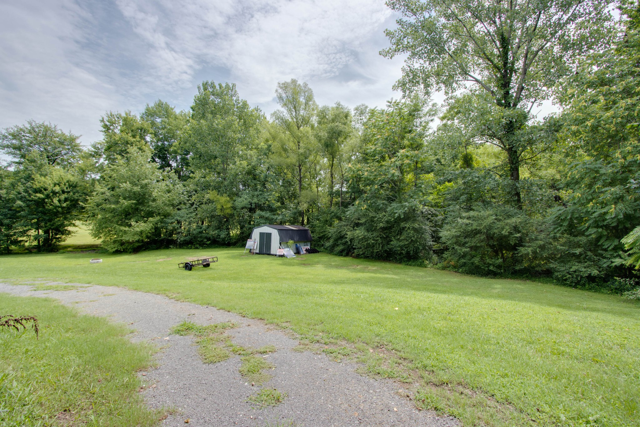 423 Ferguson Hill Road Lafayette, TN 37083 - Photo 62 of 63 a view of a golf course with a trees