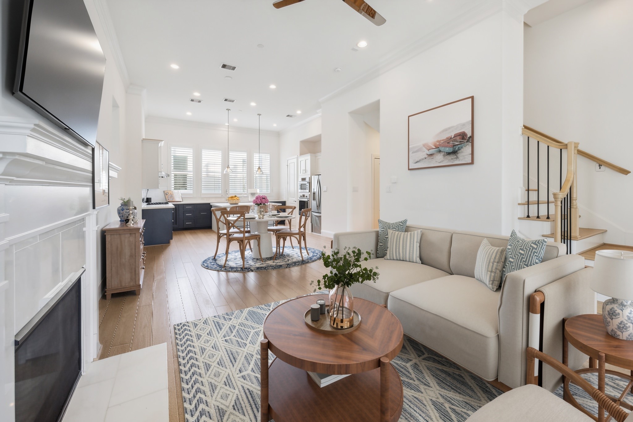 2714 Harvard Street Houston, TX 77008 - Photo 15 of 33 The 12-foot-tall ceilings on this level feature recessed lighting and a large ceiling fan.