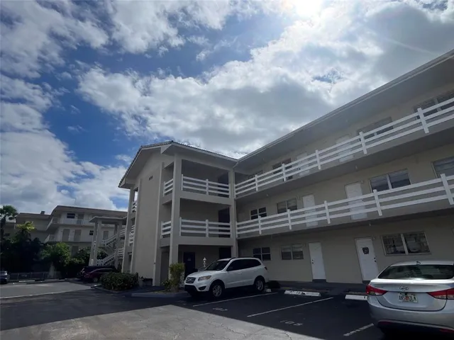 a car parked in front of a building