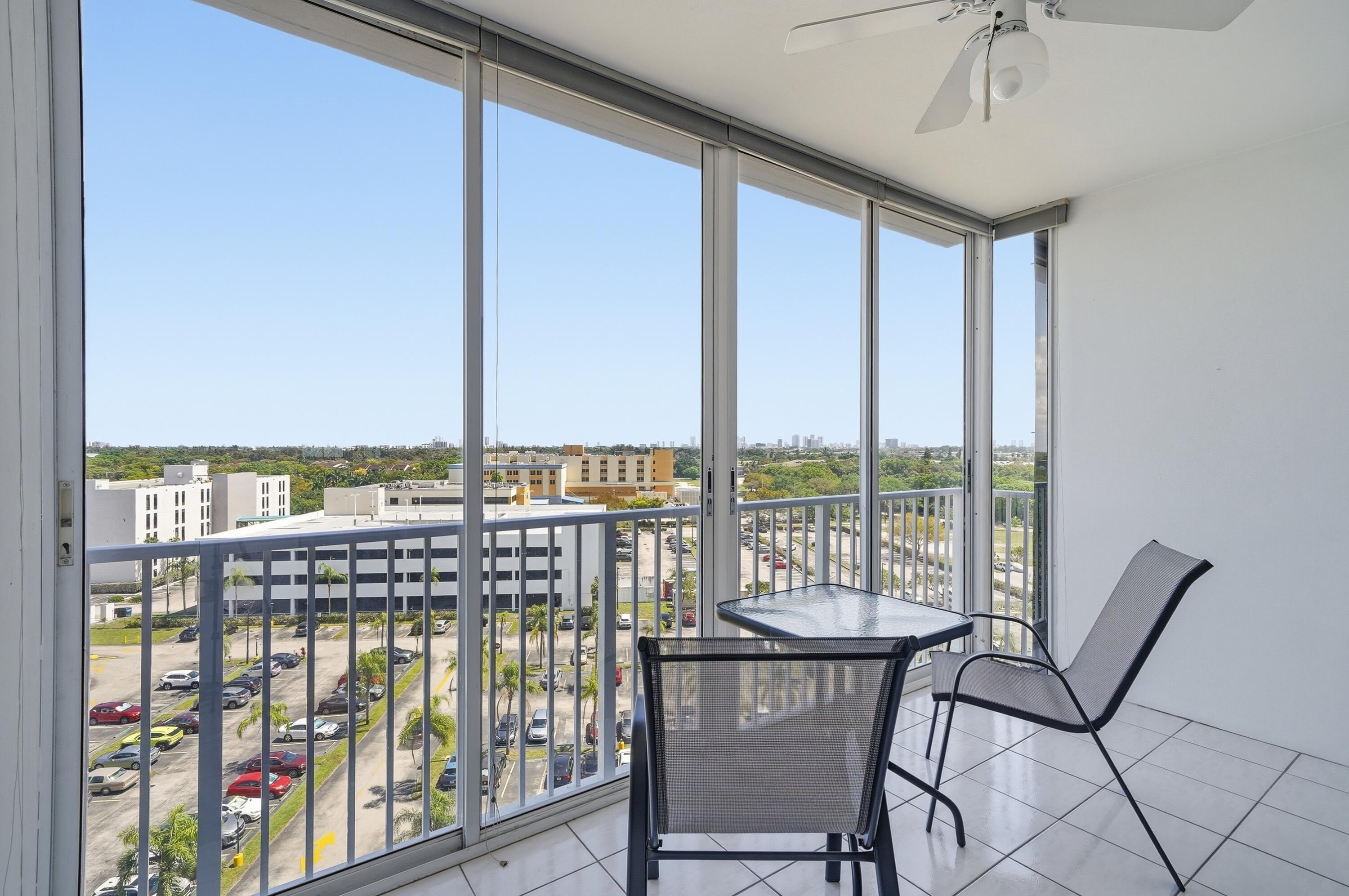 3850 Washington Street, Unit 1003 Hollywood, FL 33021 - Photo 18 of 30 a view of a balcony with furniture