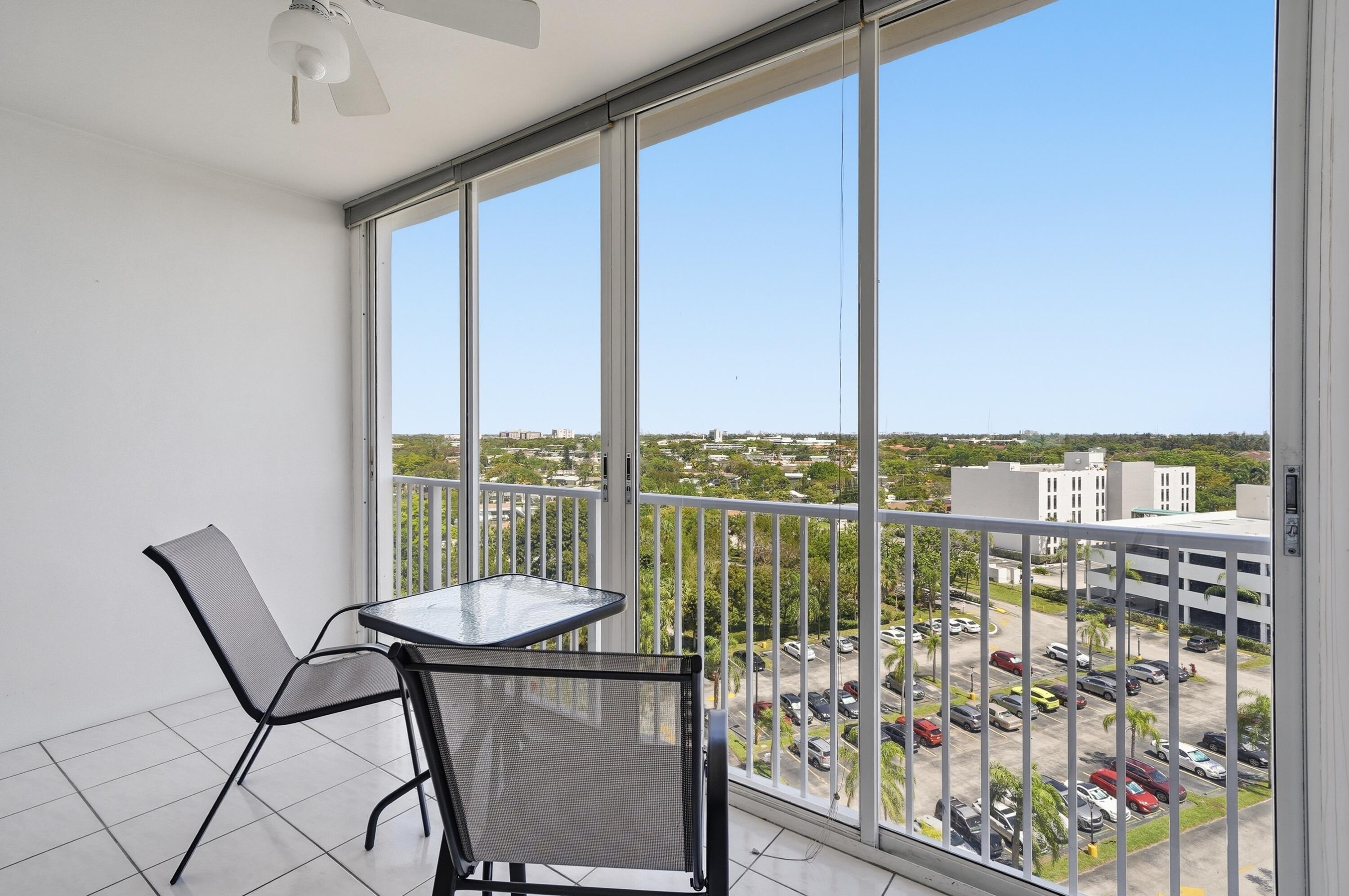 3850 Washington Street, Unit 1003 Hollywood, FL 33021 - Photo 19 of 30 a view of a balcony with chairs