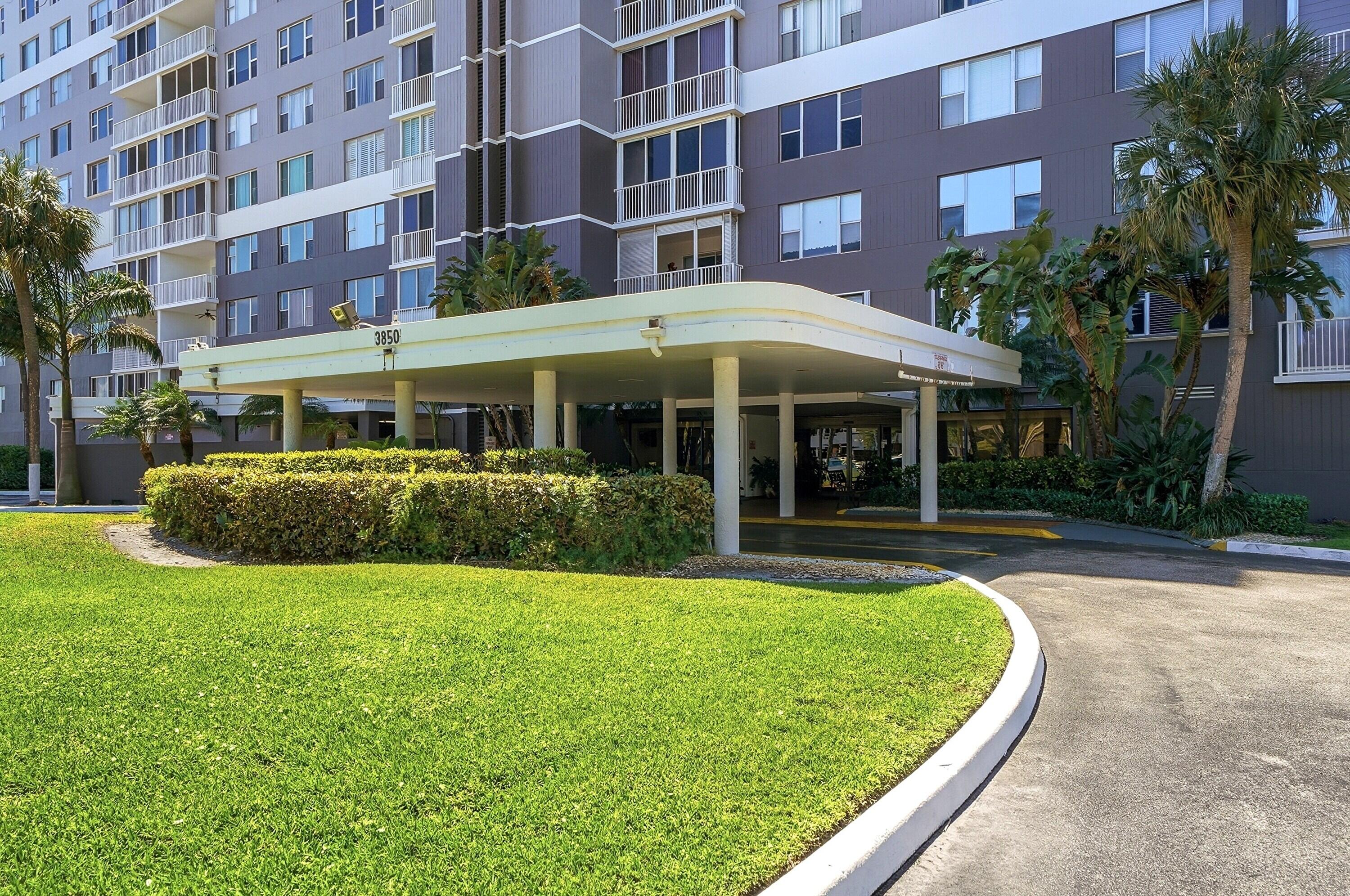 3850 Washington Street, Unit 1003 Hollywood, FL 33021 - Photo 3 of 30 a view of a building with a yard
