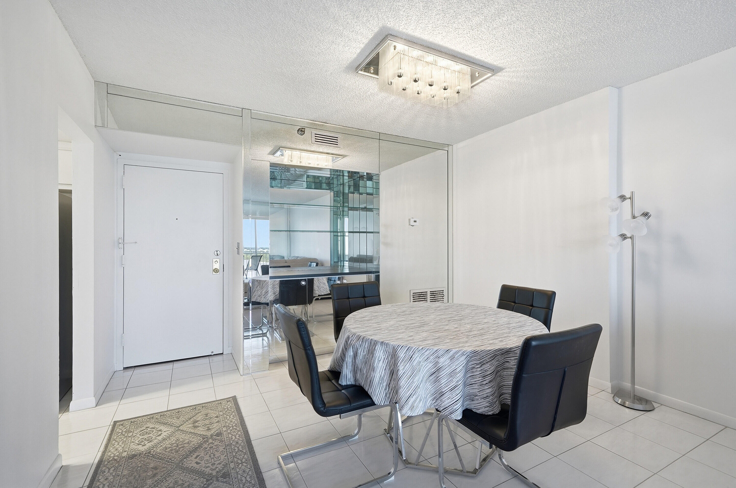 3850 Washington Street, Unit 1003 Hollywood, FL 33021 - Photo 6 of 30 a view of a dining room with furniture