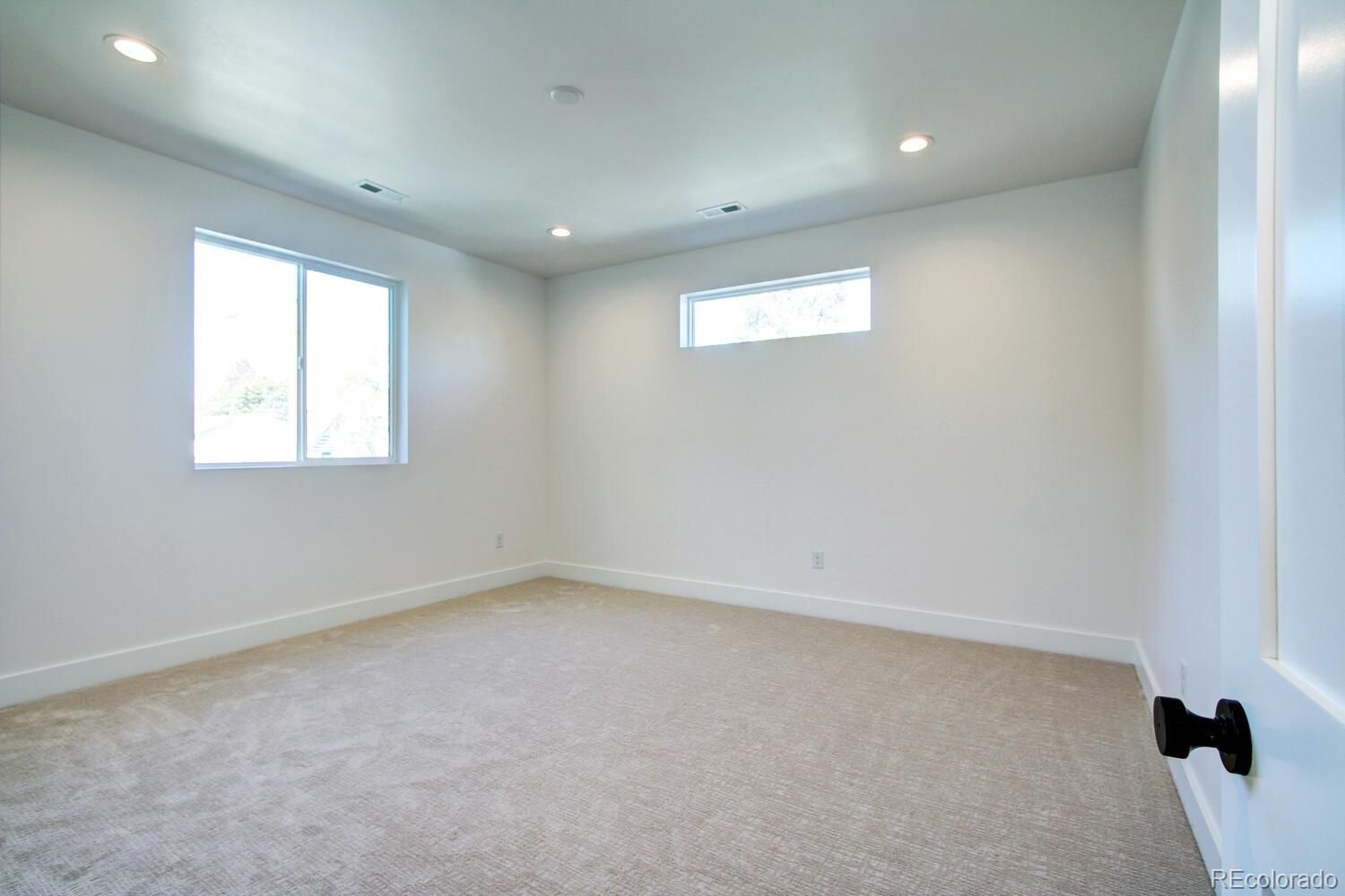 4128 Chase Street Denver, CO 80212 - Photo 22 of 42 an empty room with a window