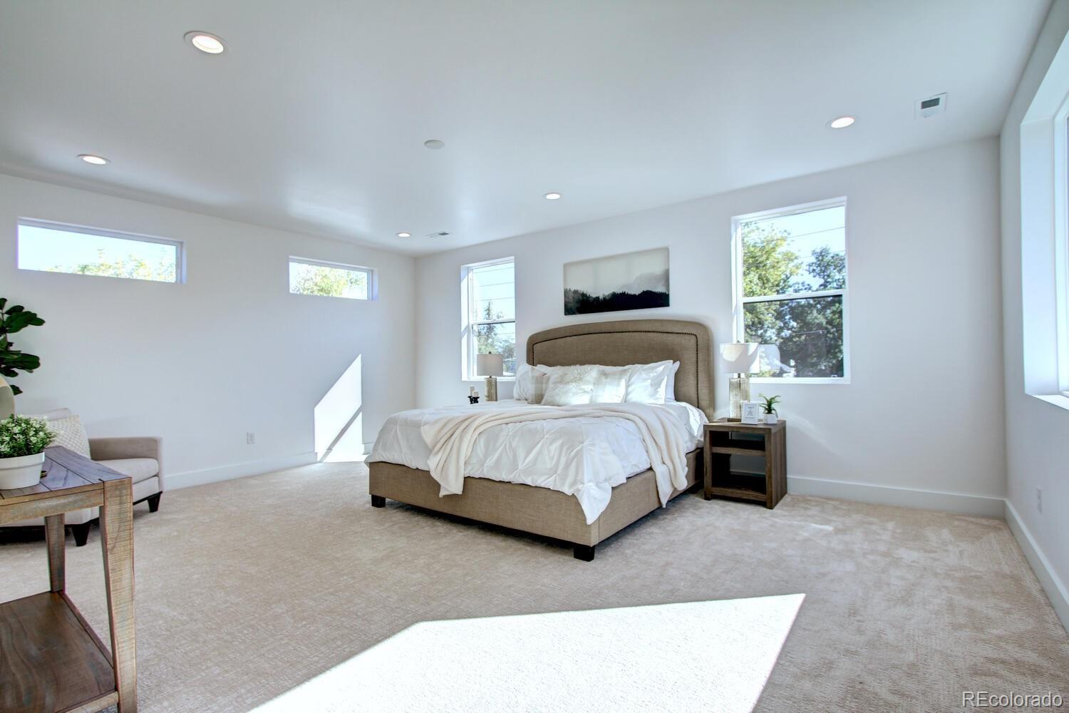 4128 Chase Street Denver, CO 80212 - Photo 26 of 42 a bedroom with a bed and a window