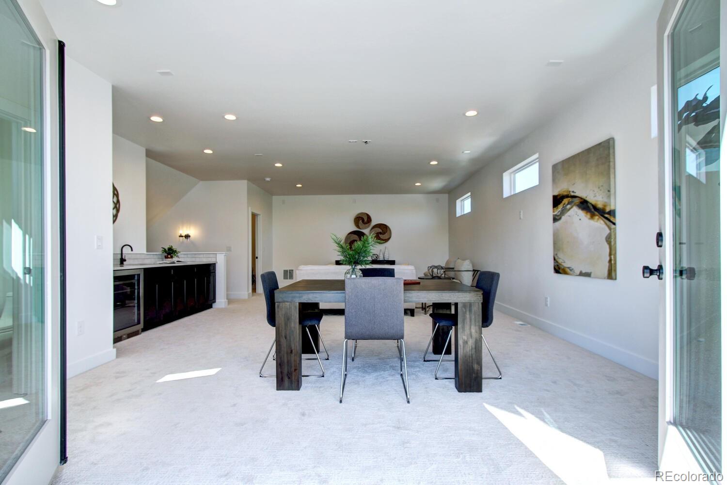 4128 Chase Street Denver, CO 80212 - Photo 37 of 42 a view of a dining room with furniture
