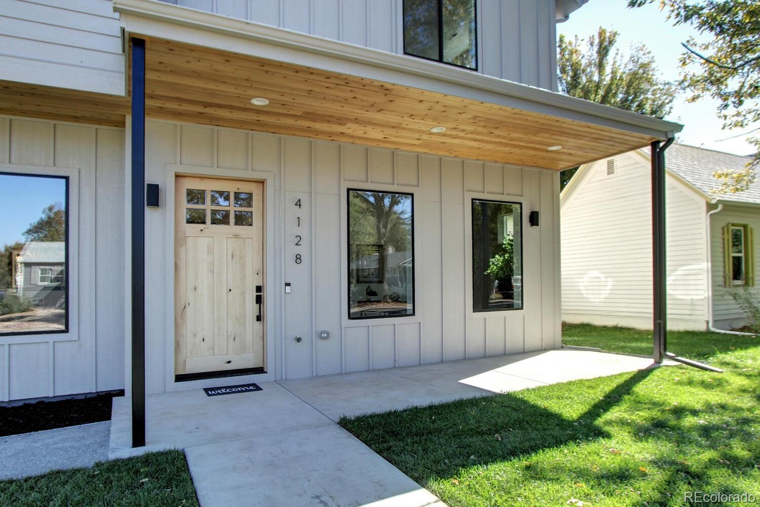 4128 Chase Street Denver, CO 80212 - Photo 4 of 42 a view of a porch with yard