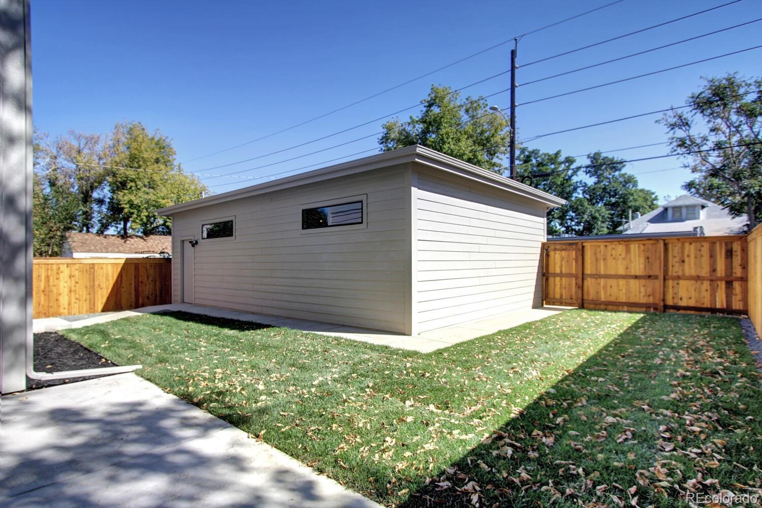 4128 Chase Street Denver, CO 80212 - Photo 41 of 42 a view of a backyard with potted plants