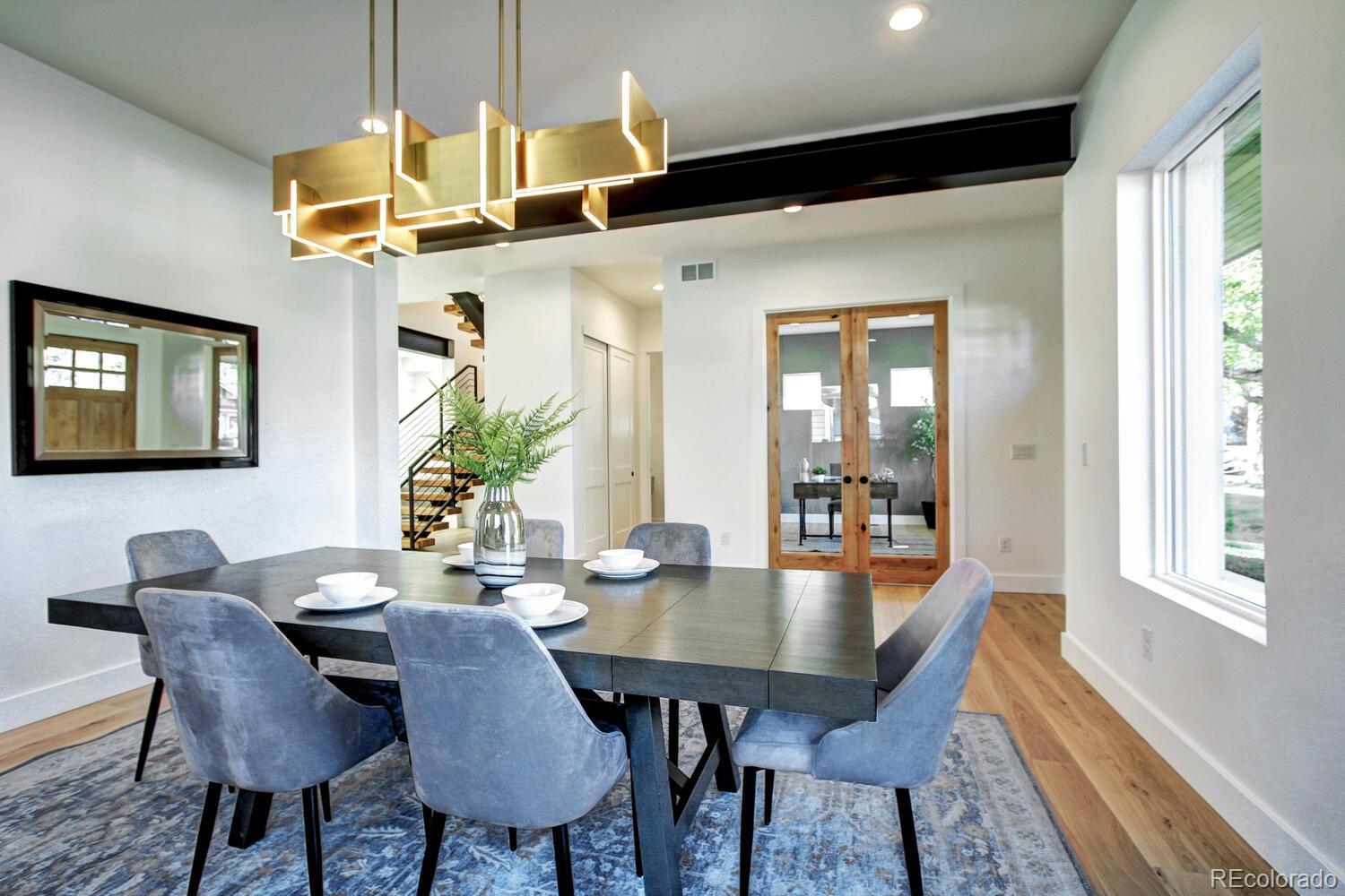 4128 Chase Street Denver, CO 80212 - Photo 5 of 42 a view of a dining room with furniture