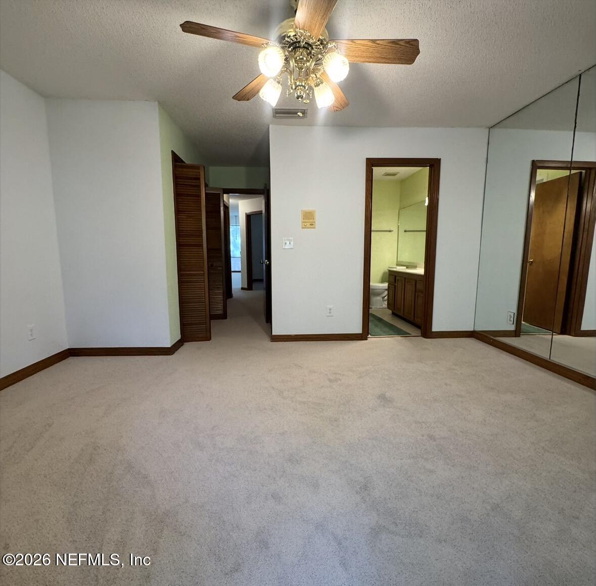 10800 Old St Augustine Road, Unit 204 Jacksonville, FL 32257 - Photo 22 of 31 Primary Bedroom with balcony