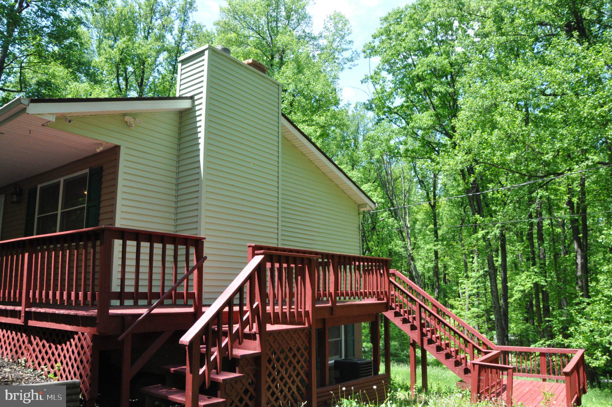 28 Henry Way Linden, VA 22642 - Photo 3 of 39 a view of a house with a deck