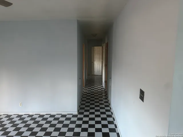 a bathroom with a shower and a toilet