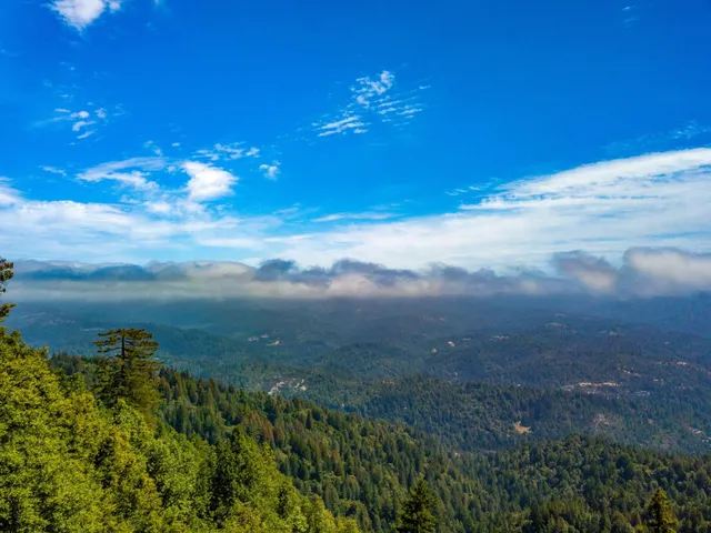 a view of mountain view with mountains in the background