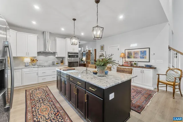a kitchen with a counter space cabinets and appliances