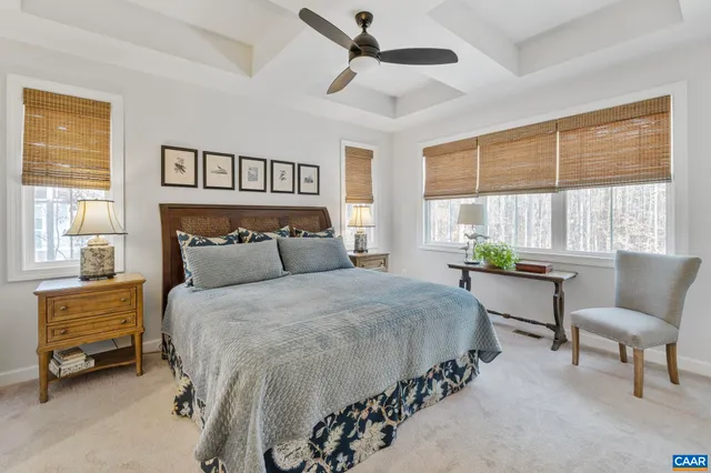 a bedroom with bed and a window