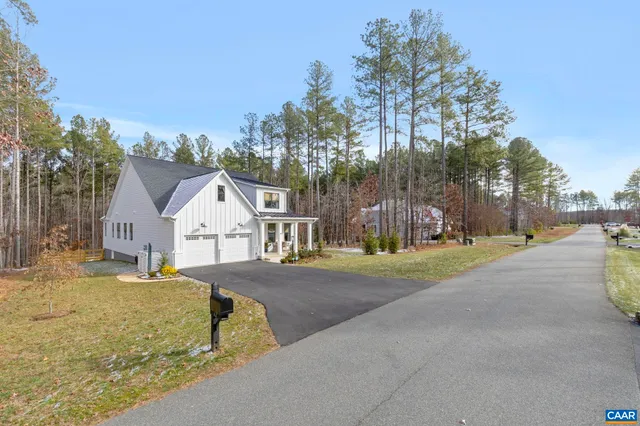 a view of a park with sitting area
