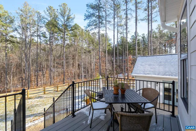 an aerial view of houses with yard