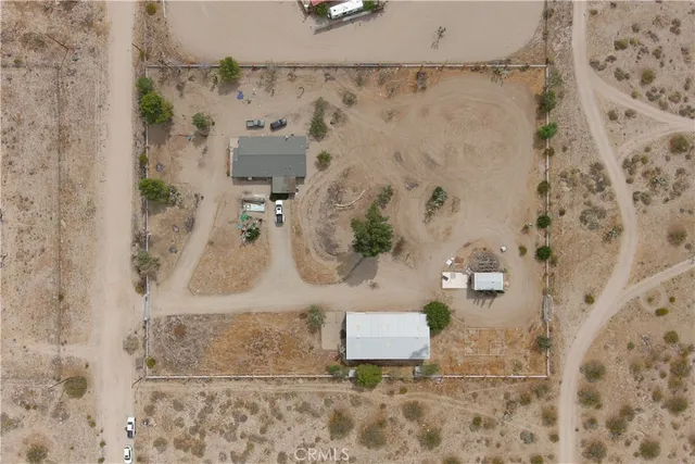 an aerial view of residential building and parking space