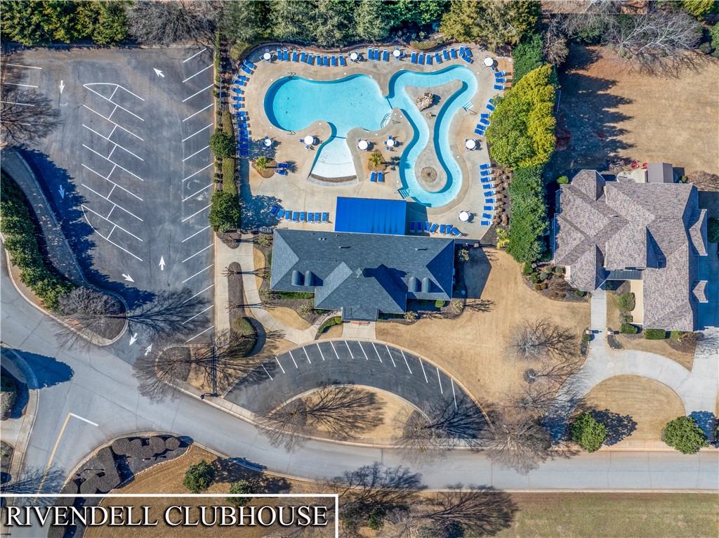 109 Limelight Drive Anderson, SC 29621 - Photo 7 of 34 An aerial view showcases a vibrant community pool, lazy river, clubhouse, fitness center and playground.
