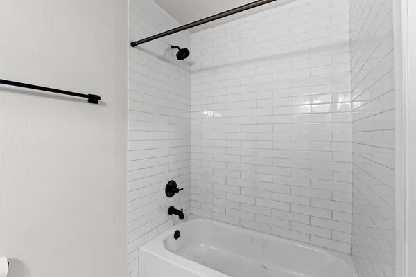 a bathroom with a bathtub