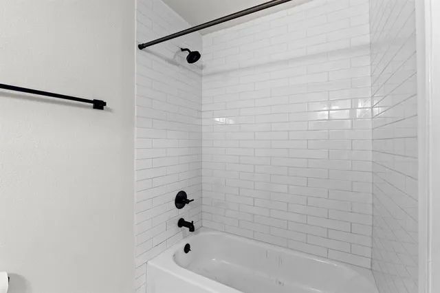 a bathroom with a bathtub