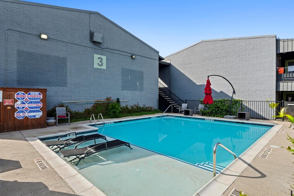 909 Reinli Street, Unit 101 Austin, TX 78751 - Photo 25 of 34 a living room with furniture pool table and paintings on the wall